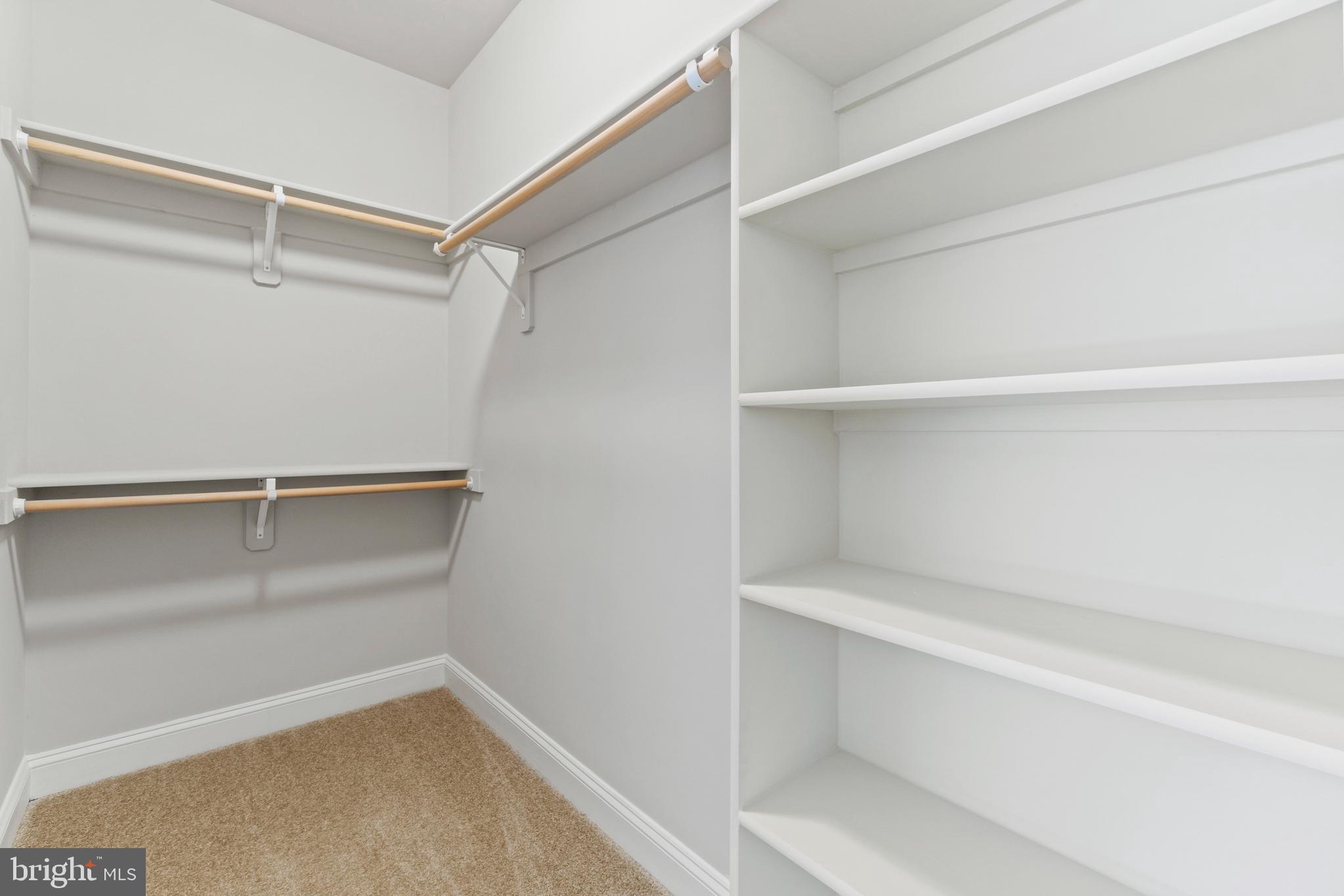 13725 Orlando Road Nokesville, VA 20181 - Photo 56 of 65 a view of an empty walk in closet