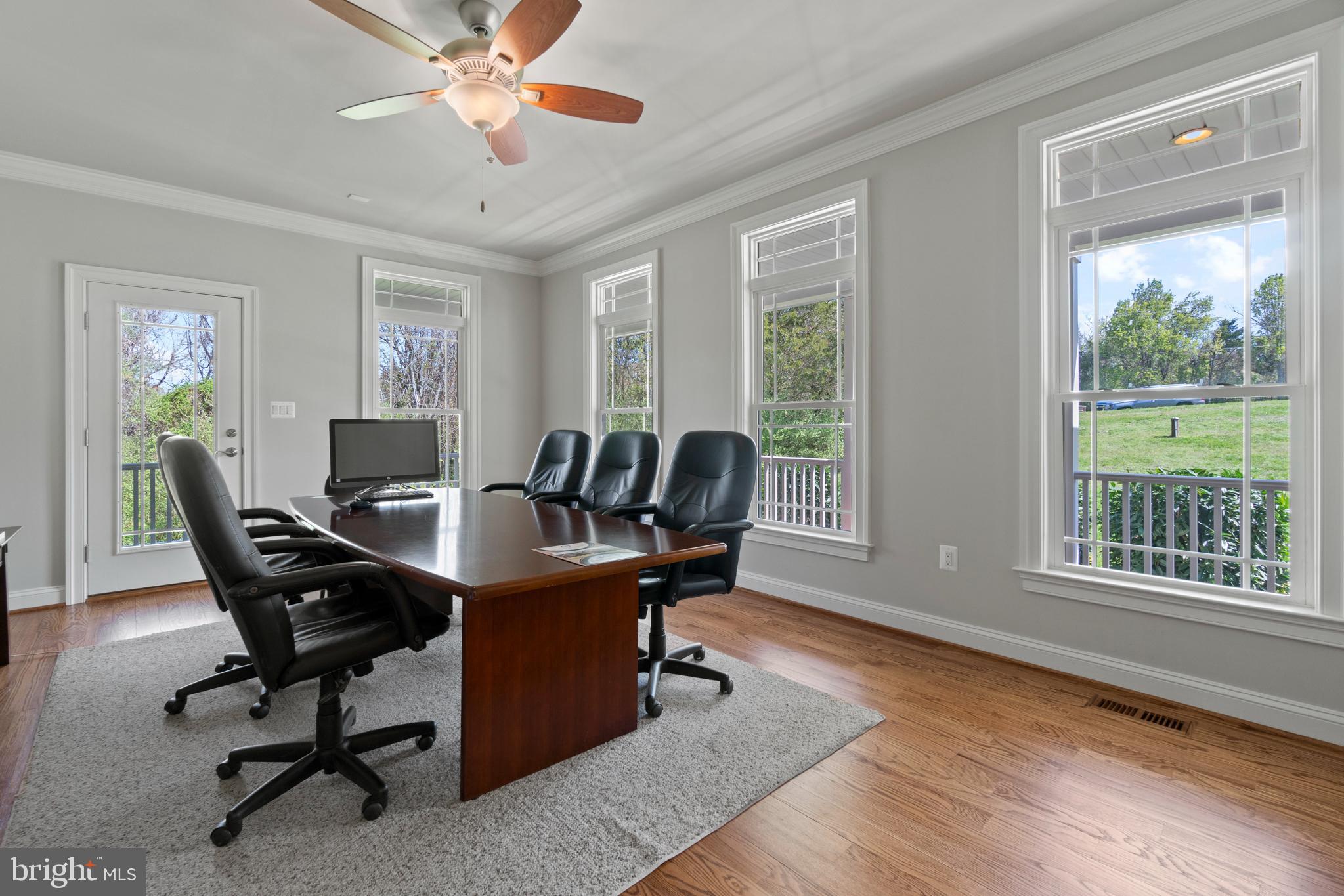 13725 Orlando Road Nokesville, VA 20181 - Photo 10 of 65 a view of a dining room with furniture window and outside view