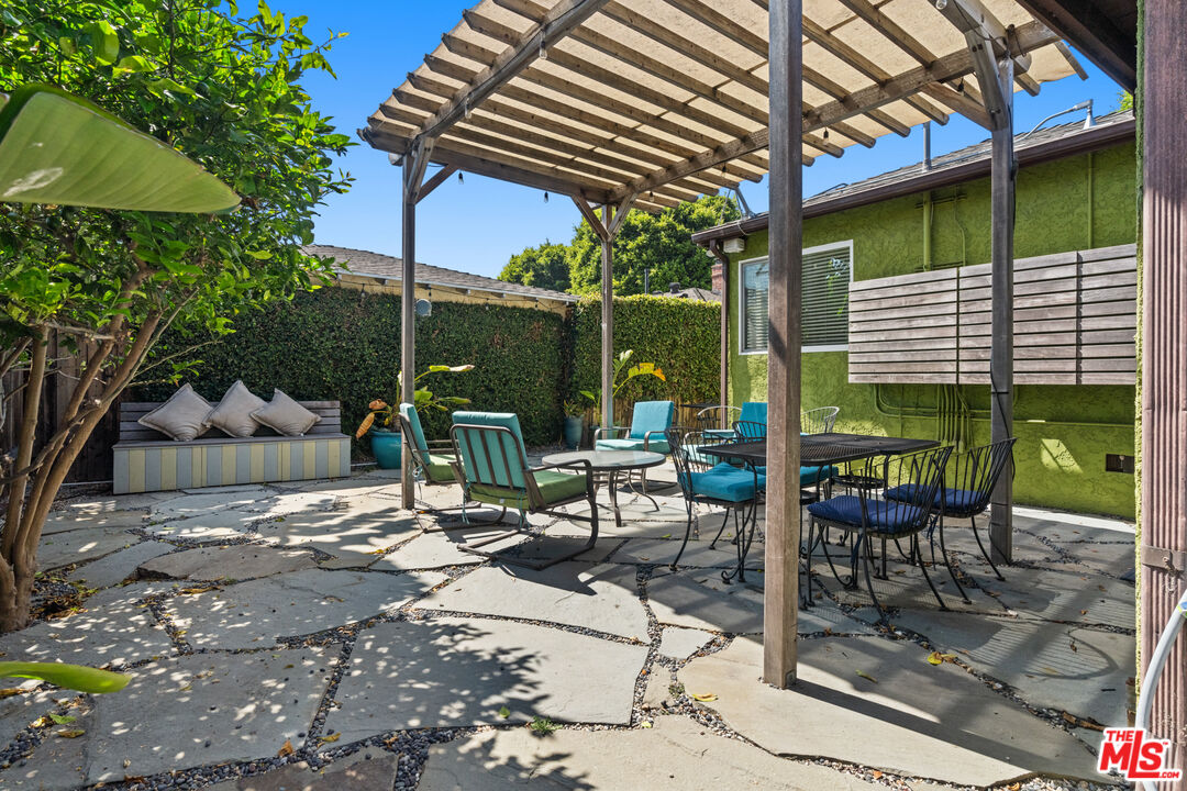 4352 Globe Avenue Culver City, CA 90230 - Photo 1 of 30 a view of chair and tables in the patio