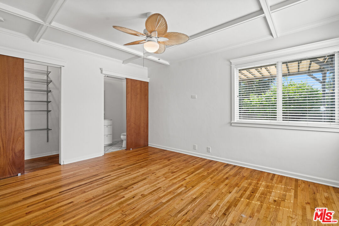 4352 Globe Avenue Culver City, CA 90230 - Photo 13 of 30 a view of empty room with wooden floor and fan