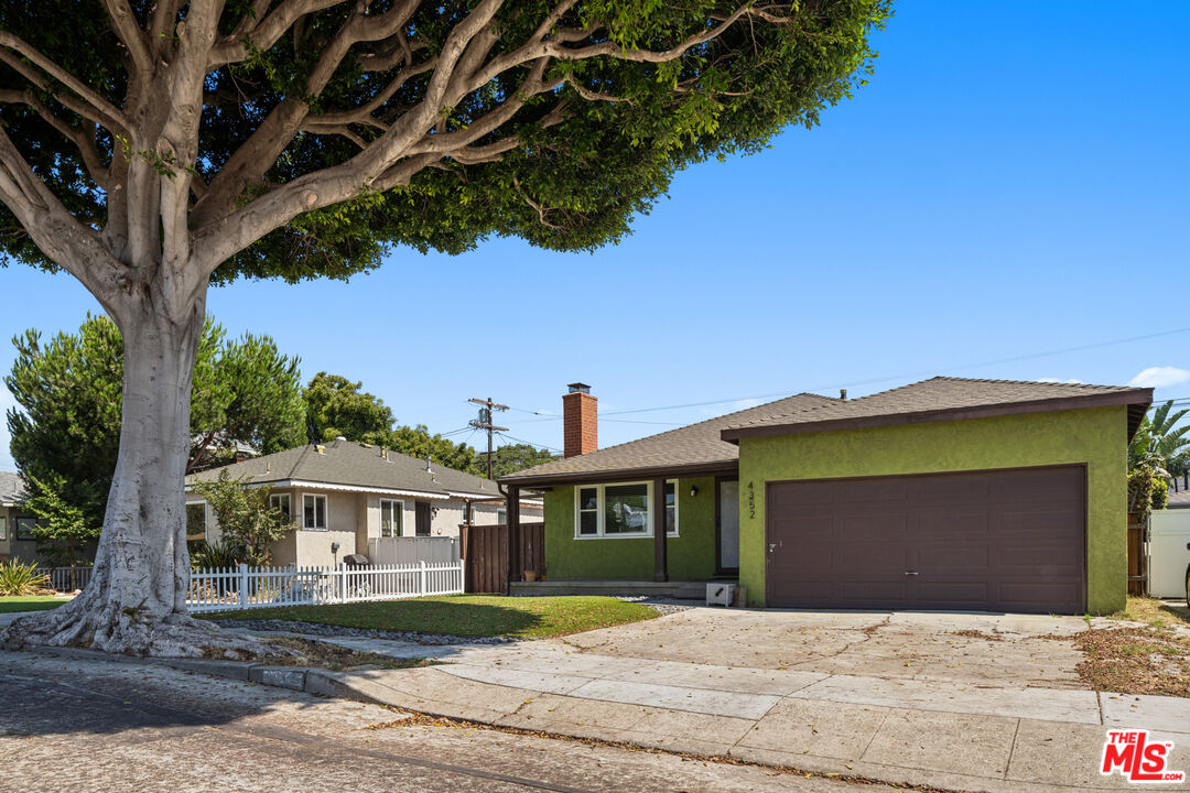 4352 Globe Avenue Culver City, CA 90230 - Photo 2 of 30 a front view of a house with a yard