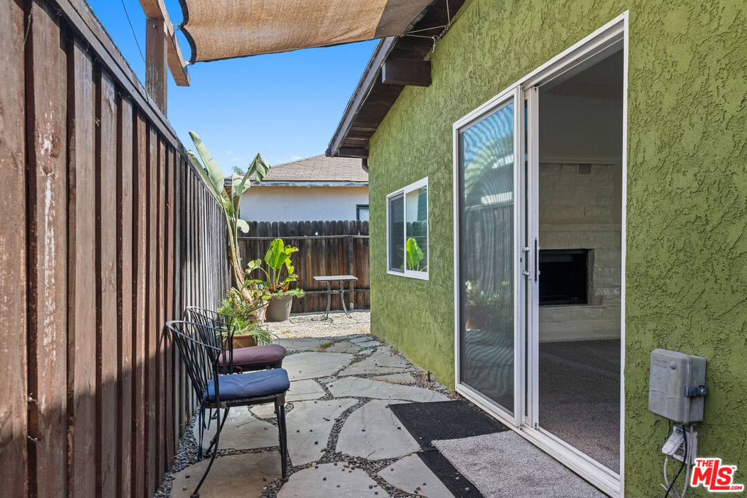 4352 Globe Avenue Culver City, CA 90230 - Photo 27 of 30 a view of a patio with table and chairs and potted plants