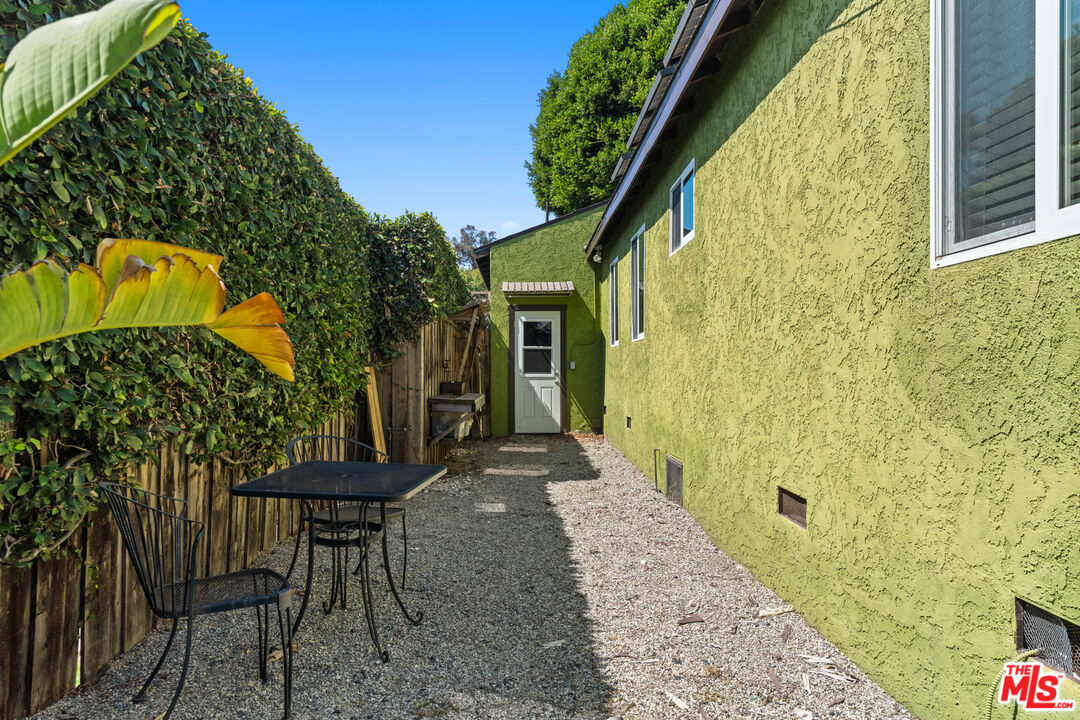 4352 Globe Avenue Culver City, CA 90230 - Photo 28 of 30 a view of a porch with furniture and a yard