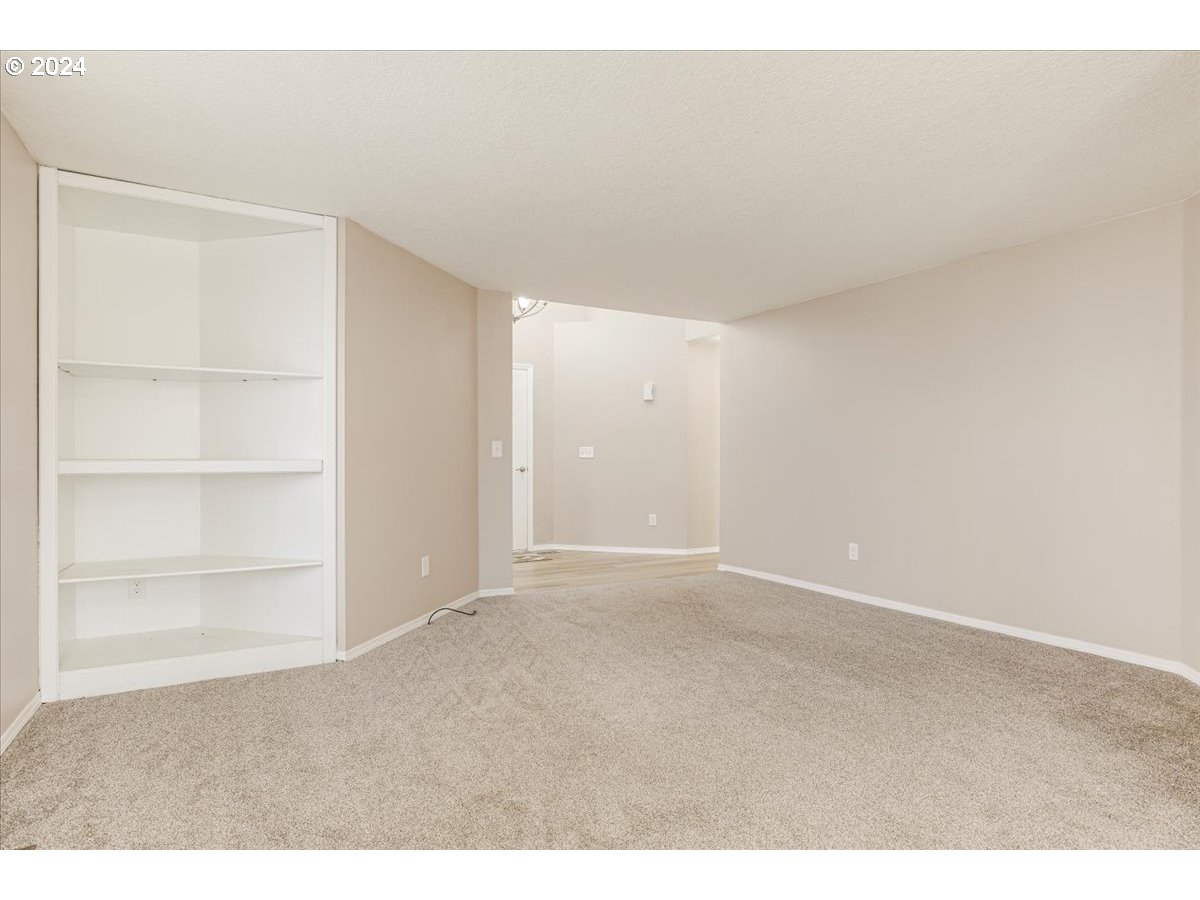 10570 Southwest Windsor Court Portland, OR 97223 - Photo 13 of 35 a view of an empty room