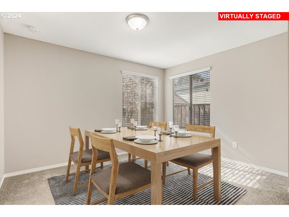 10570 Southwest Windsor Court Portland, OR 97223 - Photo 15 of 35 a dining room with furniture and window