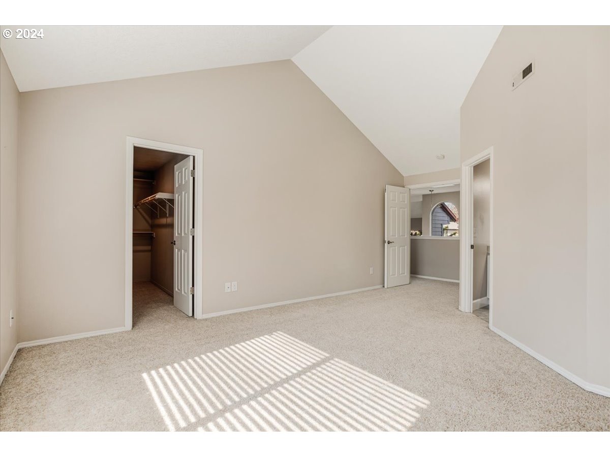 10570 Southwest Windsor Court Portland, OR 97223 - Photo 25 of 35 a view of a bedroom with closet