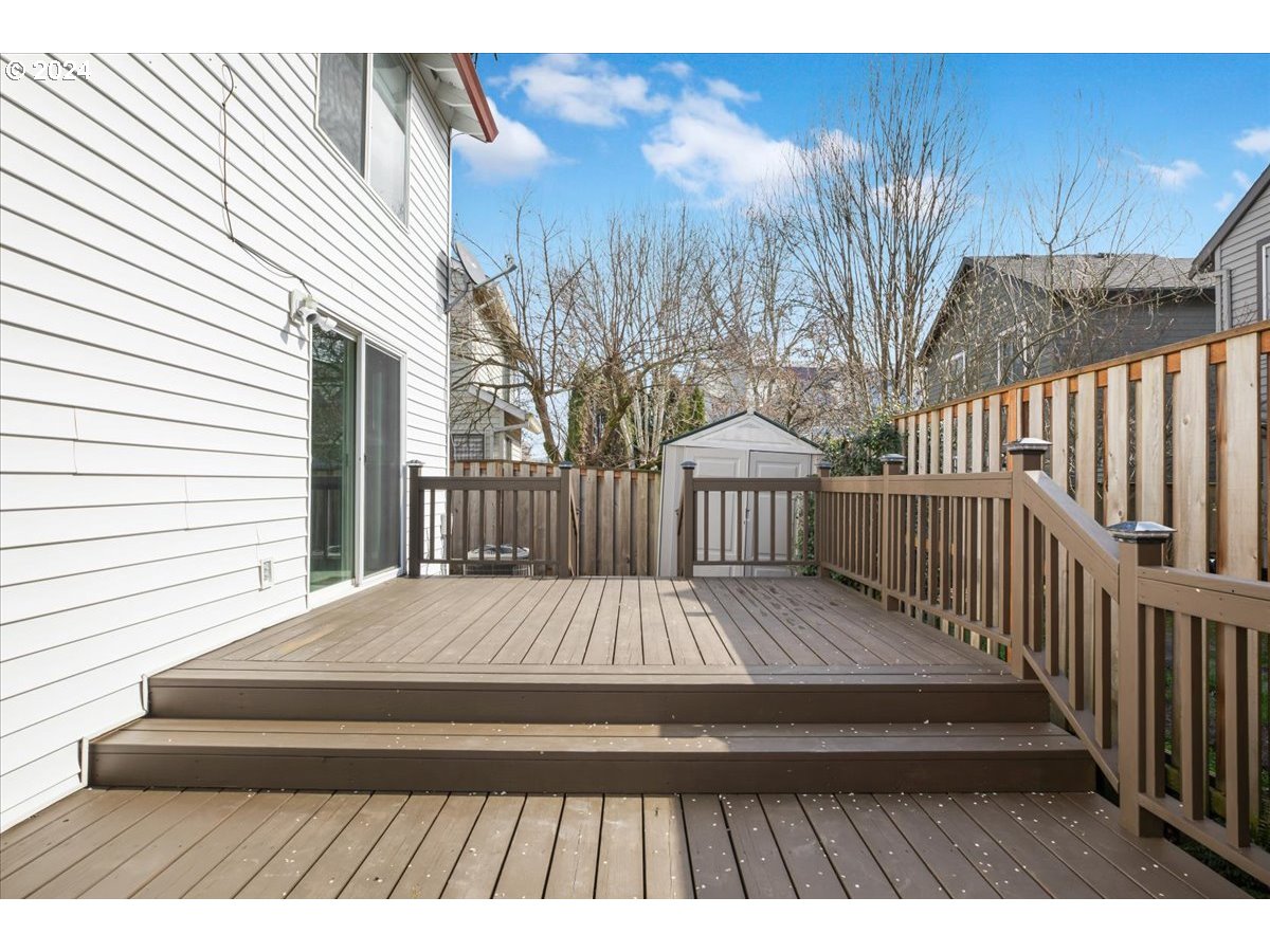 10570 Southwest Windsor Court Portland, OR 97223 - Photo 32 of 35 a view of backyard with a deck and wooden floor