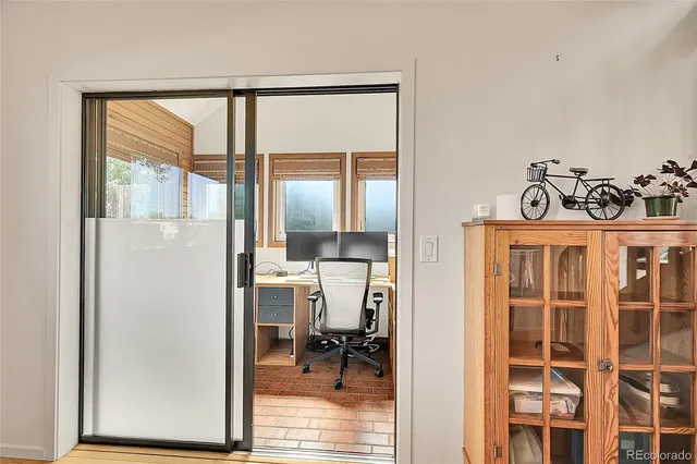 a view of livingroom with furniture and window