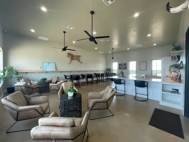 a room with gym equipment and a large window