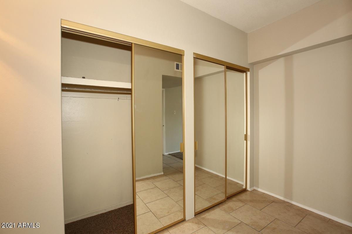 353 East Thomas Road, Unit C406 Phoenix, AZ 85012 - Photo 14 of 31 Master Bedroom-Closets