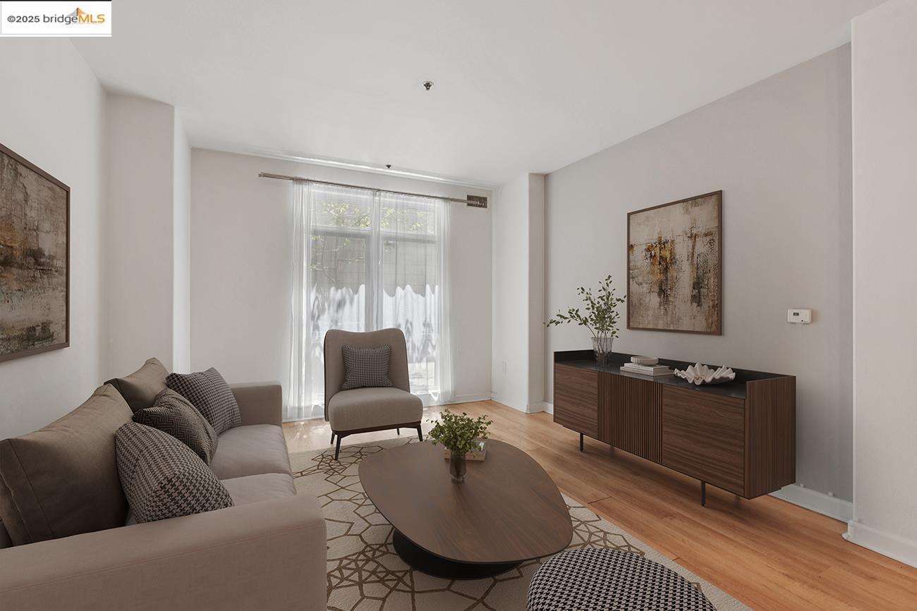 a living room with furniture or couch and a window