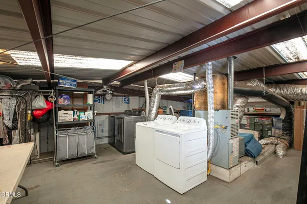 a view of a storage room with racks
