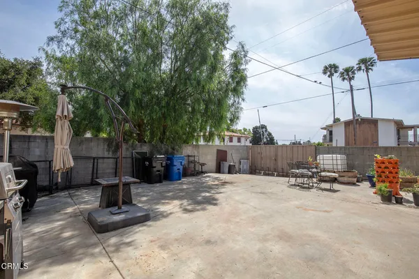 a view of a garage with a table and chairs