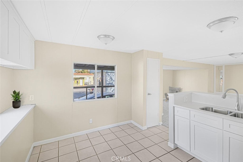 45131 28th Street East, Unit 19 Lancaster, CA 93535 - Photo 7 of 14 a view of an empty room and window