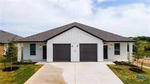 a front view of house with yard