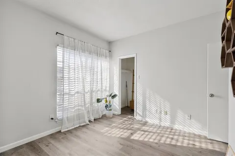 an empty room with windows