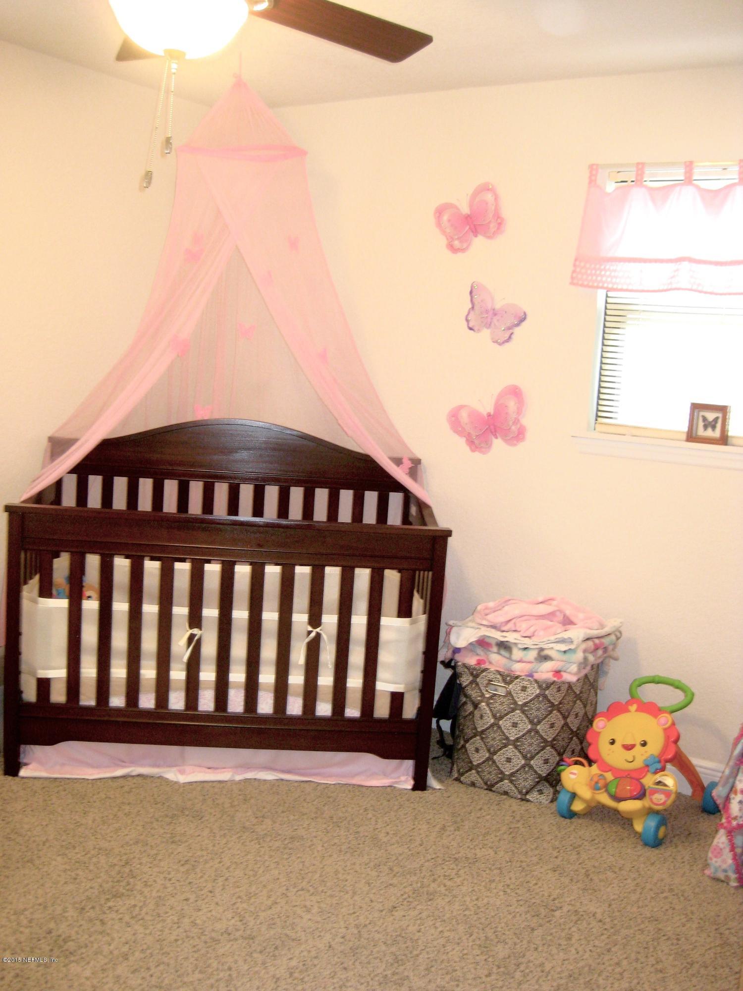 4649 Morris Road Jacksonville, FL 32225 - Photo 4 of 19 a view of a kid room