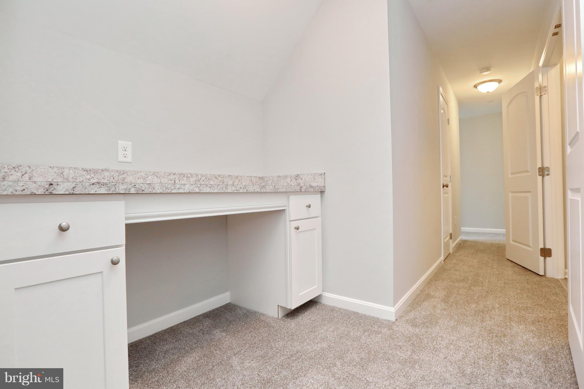 10275 South Faulkner Road Faulkner, MD 20632 - Photo 29 of 30 Laundry folding station on upper level