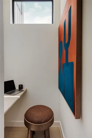 a bathroom with a toilet and a sink