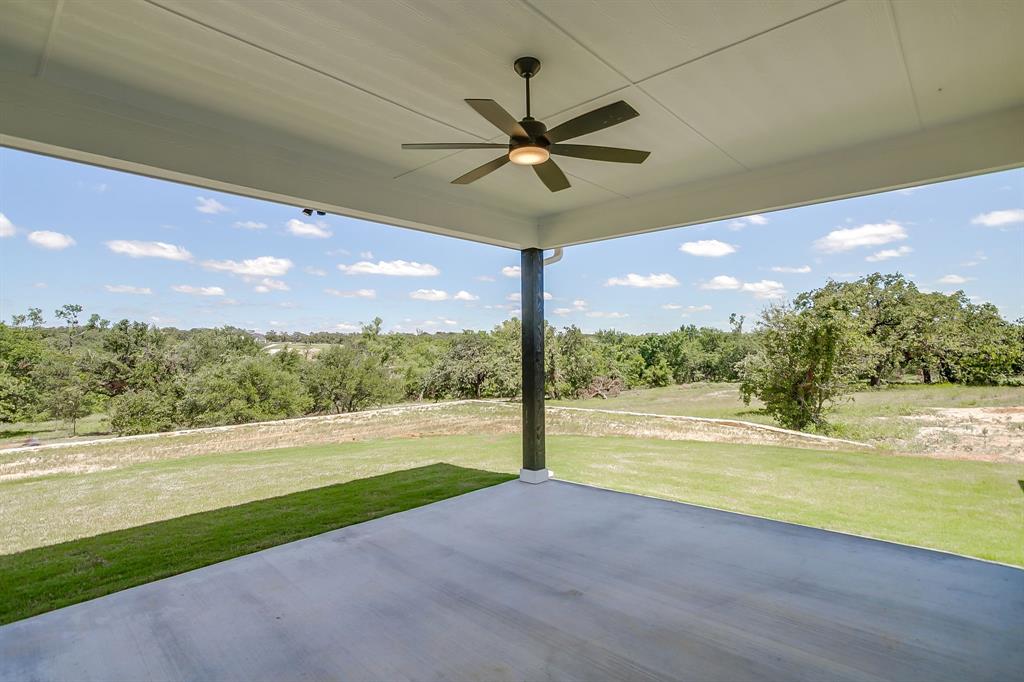 9012 Valley Oak Court Springtown, TX 76082 - Photo 36 of 40 a view of a room with a big yard