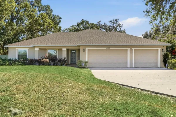 front view of house with a yard