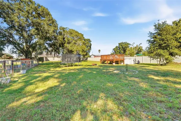 a garden view with swimming pool