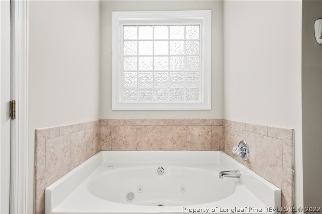 3612 Talus Road Fayetteville, NC 28306 - Photo 20 of 29 a bathroom with a bathtub