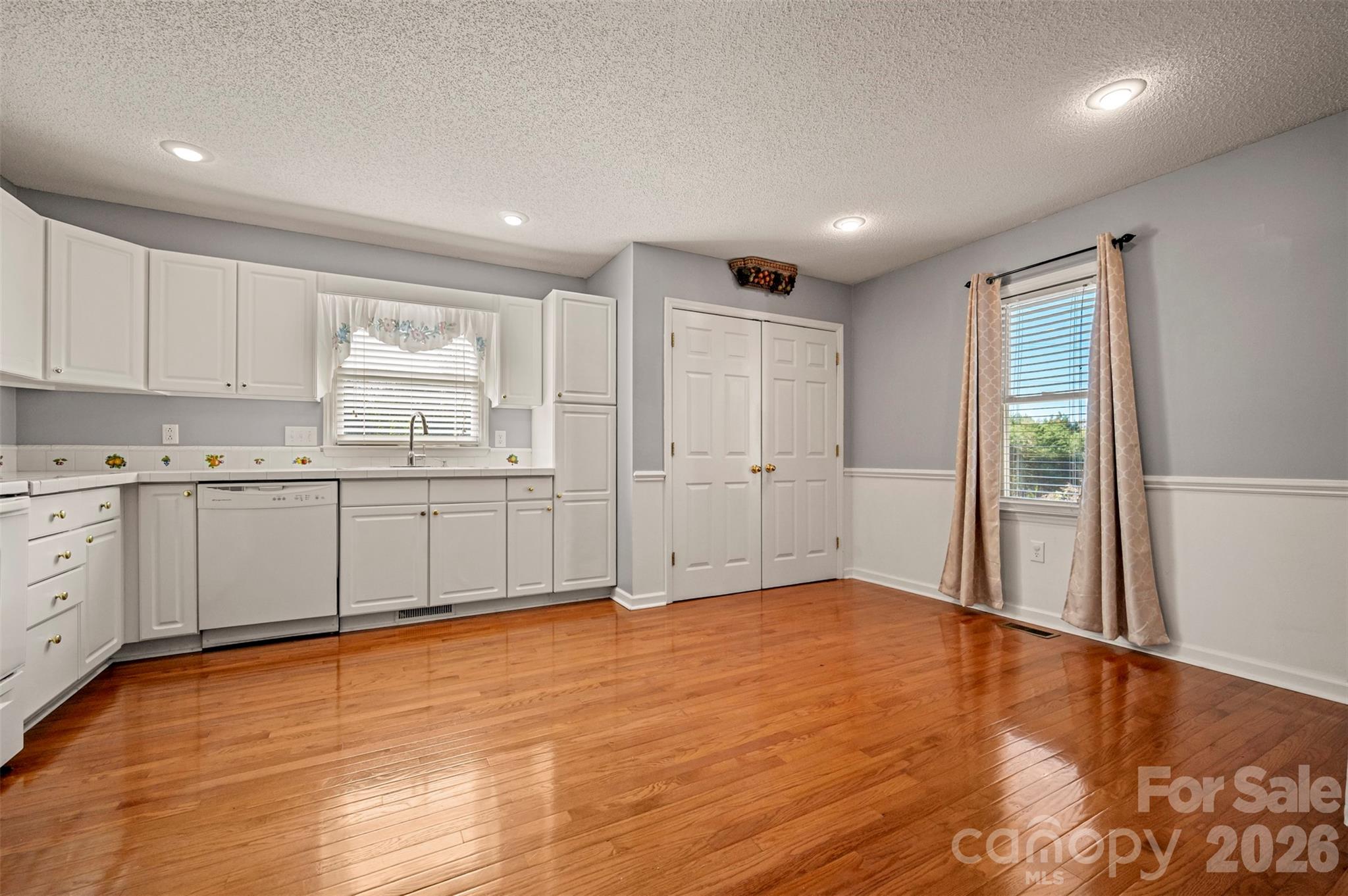 506 Pleasant Street Spindale, NC 28160 - Photo 10 of 42 a view of a kitchen with wooden floor