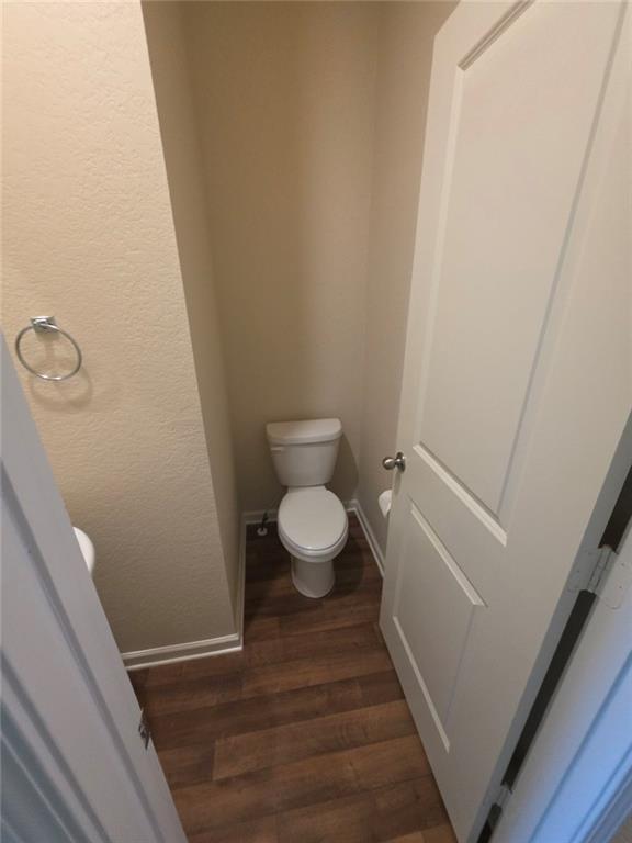 899 Independence Avenue Pendergrass, GA 30567 - Photo 3 of 16 a bathroom with a toilet and a sink