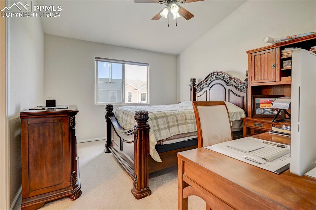 7675 Sandy Springs Point Fountain, CO 80817 - Photo 14 of 32 a living room with furniture a piano and a window