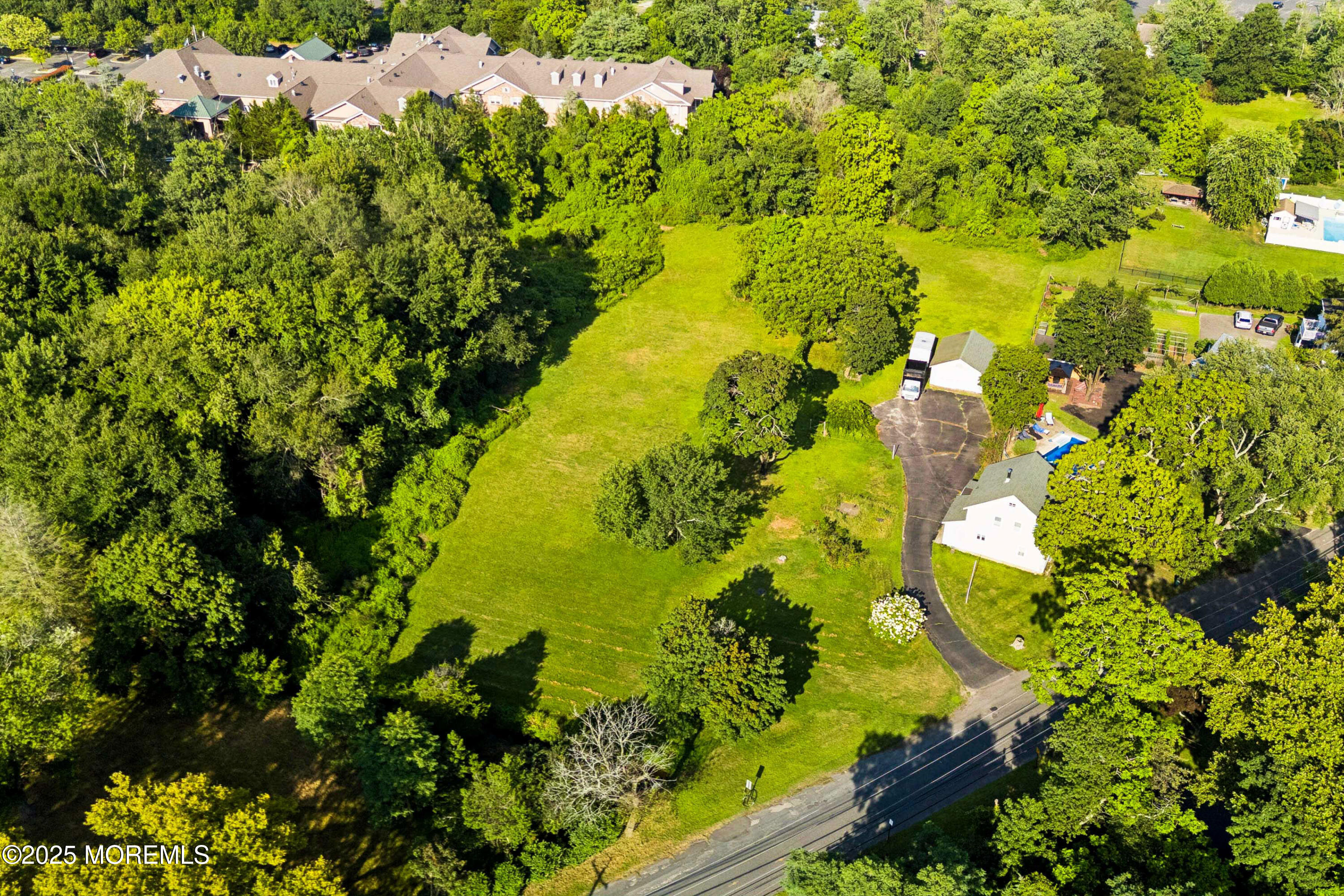 2628 East Hurley Pond Road Wall, NJ 07719 - Photo 12 of 40 a view of a garden