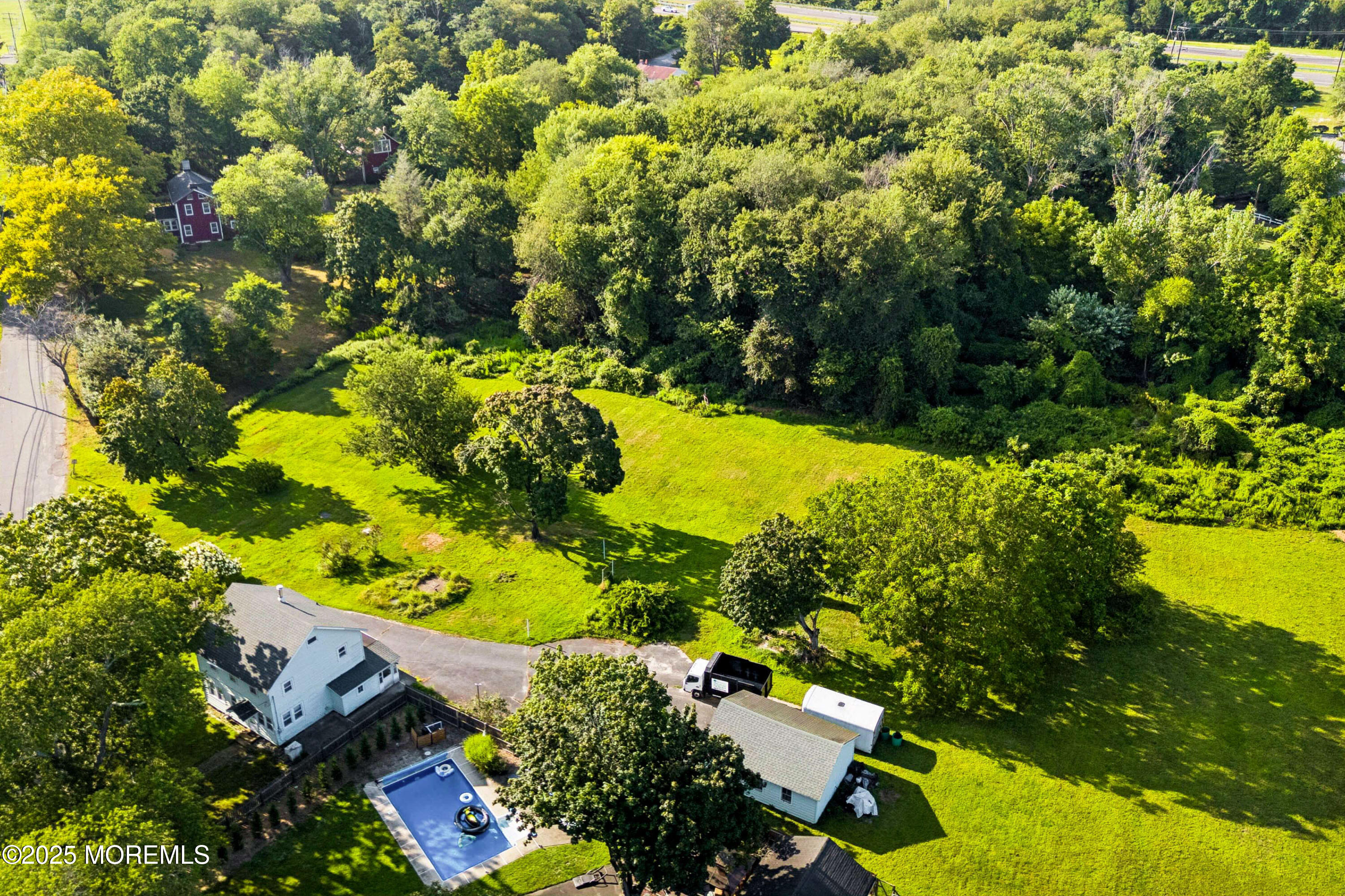 2628 East Hurley Pond Road Wall, NJ 07719 - Photo 14 of 40 a view of a garden with plants