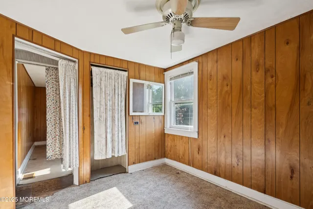 a bathroom with a toilet a sink and shower
