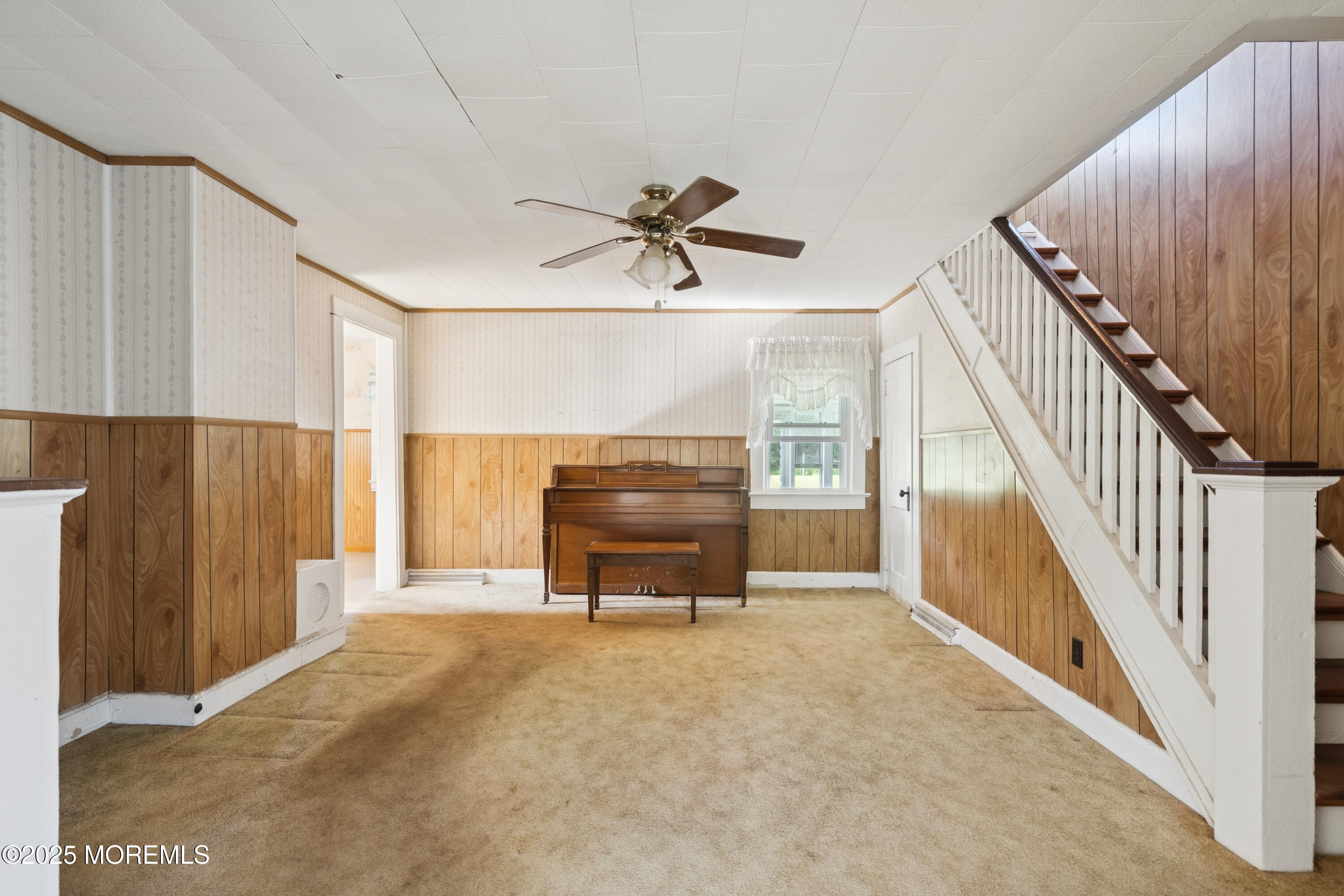 2628 East Hurley Pond Road Wall, NJ 07719 - Photo 2 of 40 a view of a livingroom with furniture and staircase
