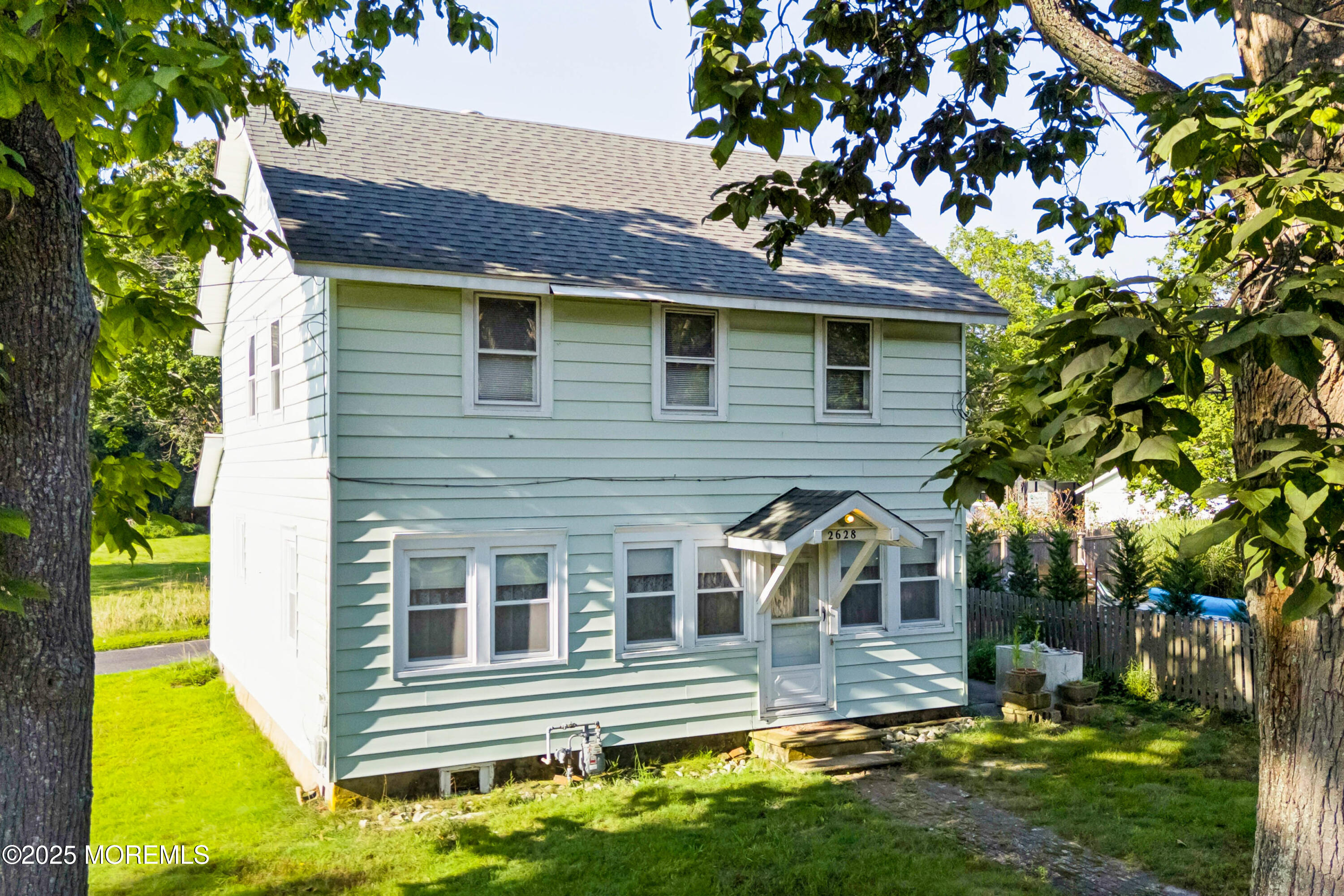 2628 East Hurley Pond Road Wall, NJ 07719 - Photo 24 of 40 a front view of a house with garden