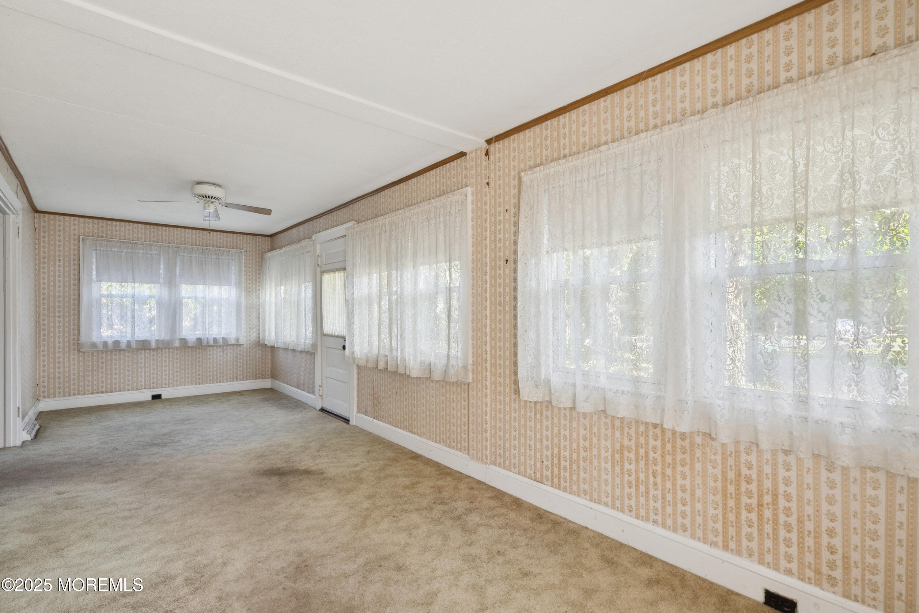 2628 East Hurley Pond Road Wall, NJ 07719 - Photo 27 of 40 a view of an empty room with a window