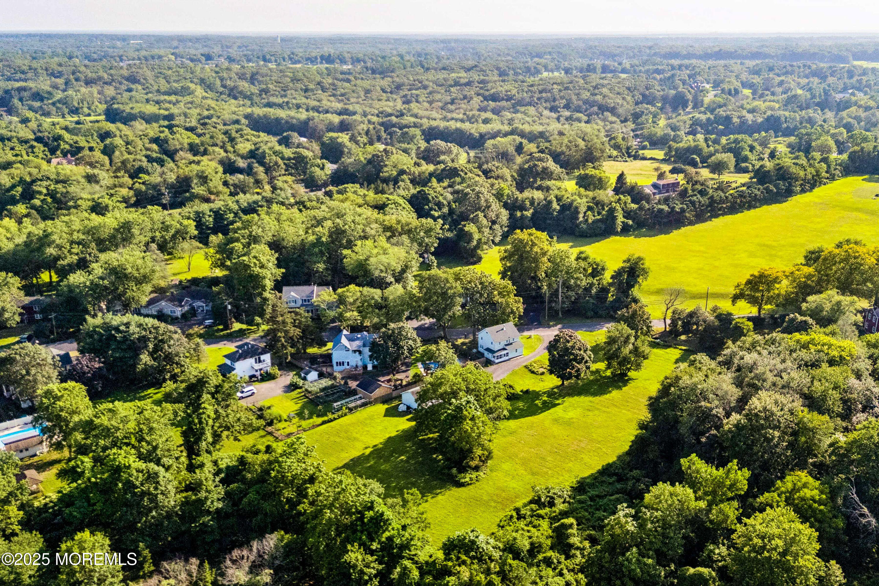 2628 East Hurley Pond Road Wall, NJ 07719 - Photo 32 of 40 an aerial view of residential houses with outdoor space