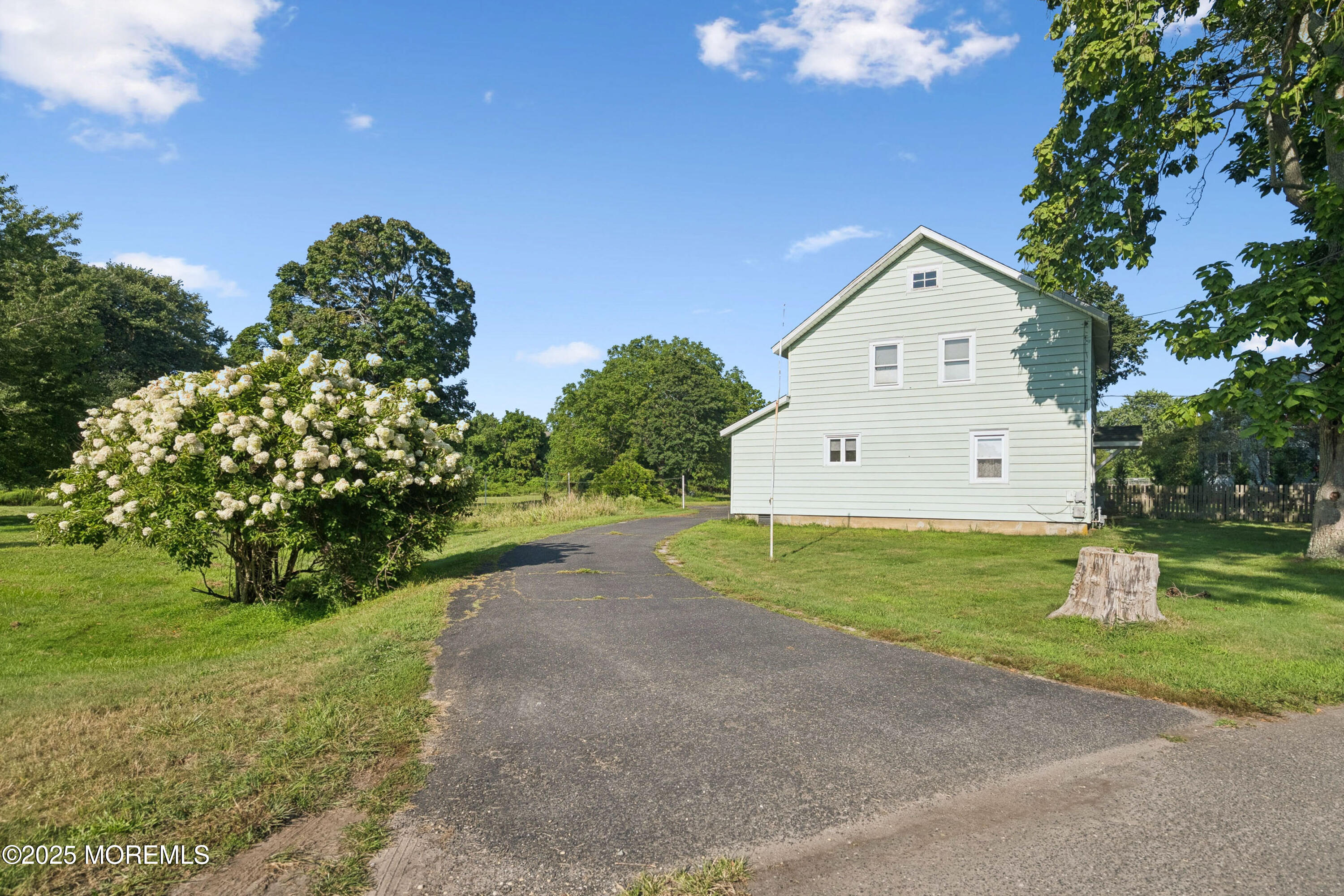 2628 East Hurley Pond Road Wall, NJ 07719 - Photo 40 of 40 a view of a house with a yard