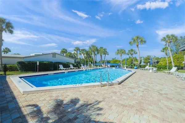 $699,000 | 101 Whispering Sands Drive, Unit 105, Sarasota, FL 34242