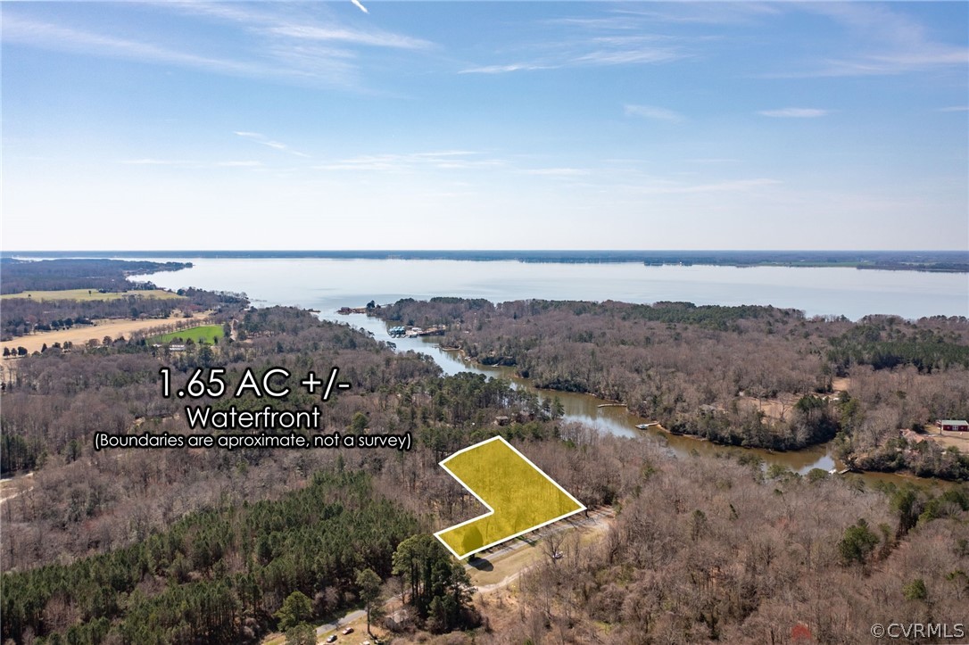 0 Thomas Landing Road Lancaster, VA 22503 - Photo 3 of 44 an aerial view of residential house and lake view