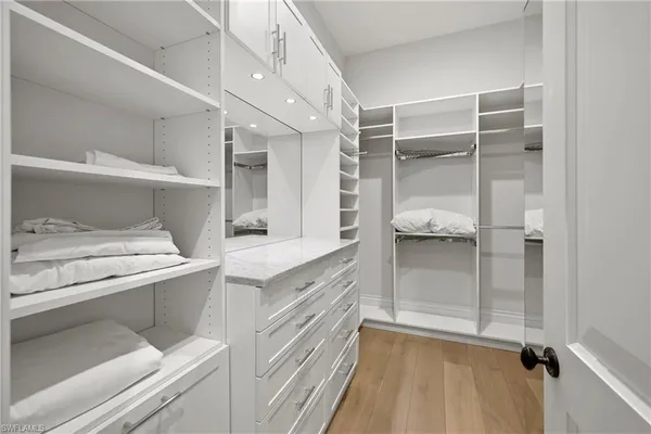 a bathroom with a shower and a sink