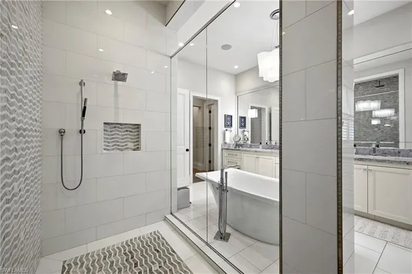a bathroom with a shower and a sink