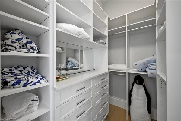 a view of a kitchen with appliances and cabinets
