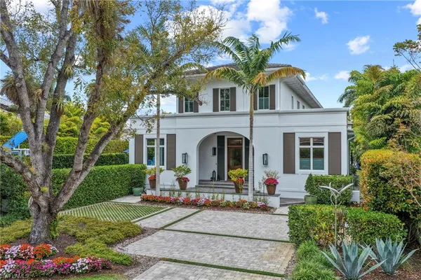 a front view of a house with entertaining space