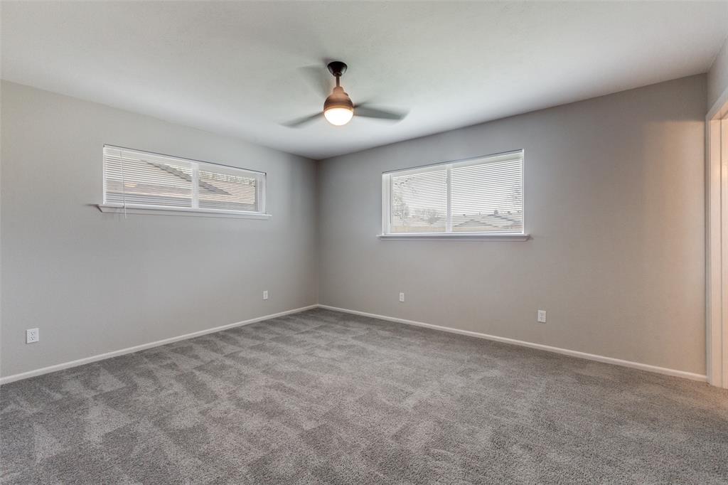 3406 Blue Ridge Lane Garland, TX 75042 - Photo 17 of 25 a view of an empty room with a window