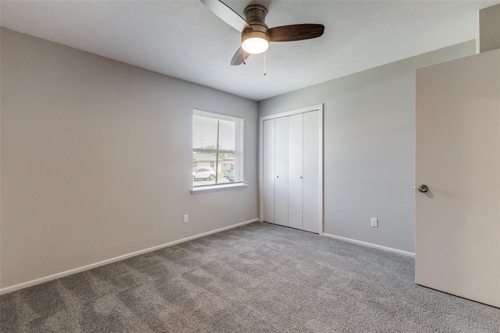 3406 Blue Ridge Lane Garland, TX 75042 - Photo 19 of 25 a view of an empty room with a window