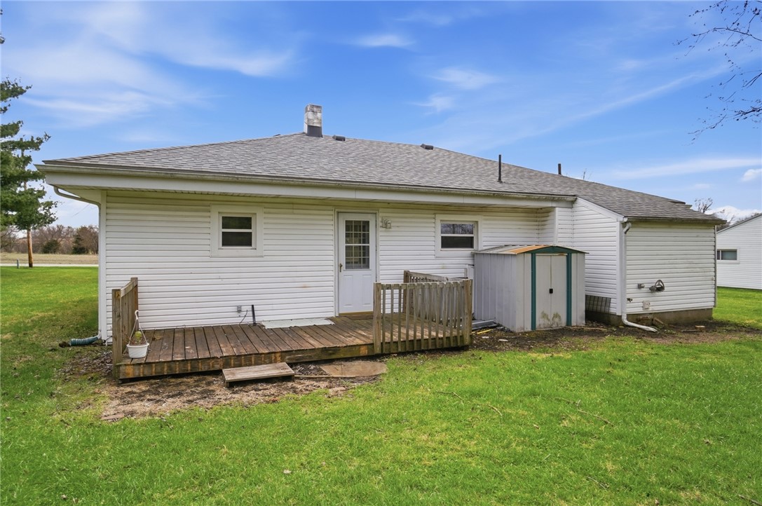 1166 West Sparrow Road Springfield, OH 45502 - Photo 35 of 40 This outdoor space offers a private deck and a versatile storage shed, perfect for outdoor living.