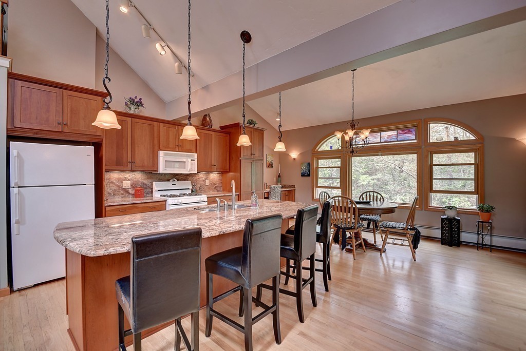 126 Wales Road Holland, MA 01521 - Photo 13 of 24 a view of a dining room with furniture window and wooden floor