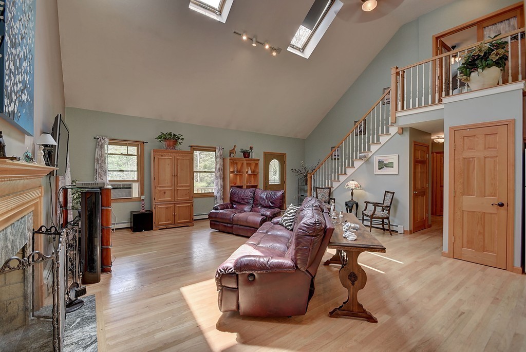 126 Wales Road Holland, MA 01521 - Photo 10 of 24 a living room with furniture window and wooden floor