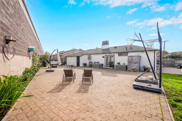 a house view with a backyard space